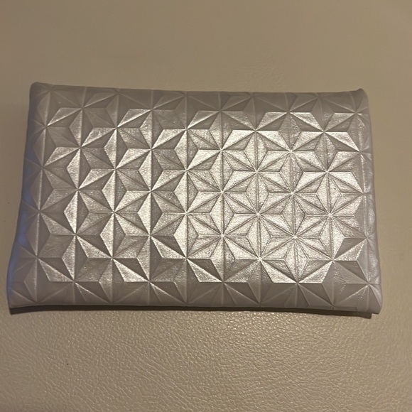 ipsy Handbags - ISPY White Embossed Geometric Print Blue Zipper Clutch Travel Cosmetic Bag